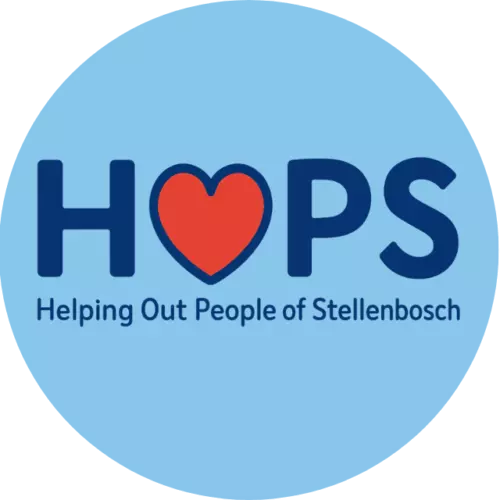 The logo for HOPS (Helping Out People of Stellenbosch), which features the text 'HOPS' in dark blue with a bright red heart replacing the letter 'O', set against a light blue circular background, with the full name 'Helping Out People of Stellenbosch' written underneath.