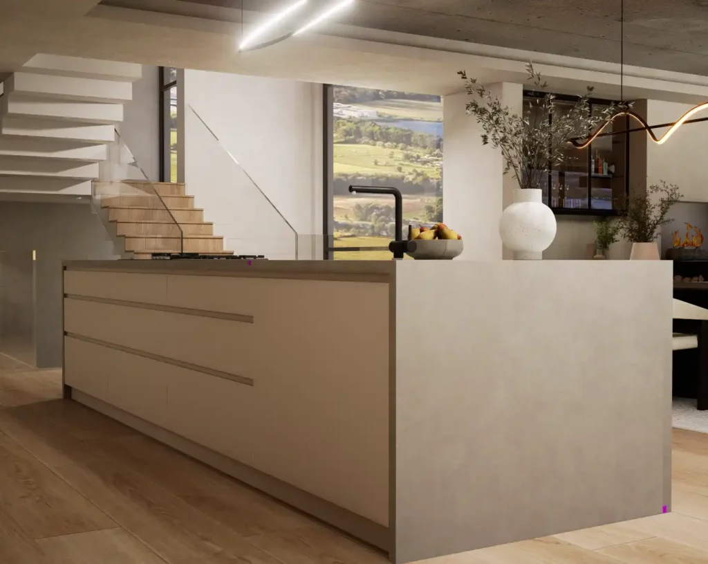 A modern concrete kitchen island with built-in drawers, a black faucet, and decorative vases, set against a wooden staircase and a scenic window view.